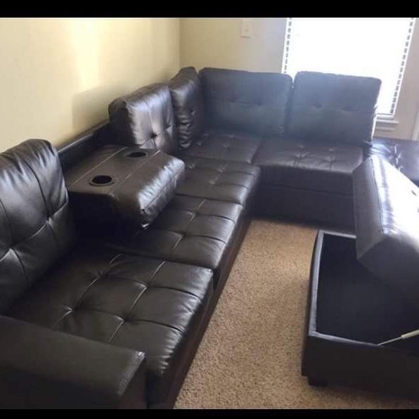 BLACK LEATHER SECTIONAL SOFA WITH OTTOMAN INCLUDED NEW (DELIVERY AVAILABLE )