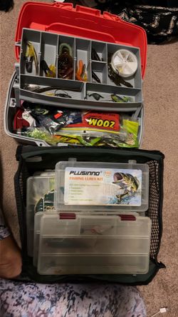 A ton of fishing stuff hooks lures other tackle and the cases