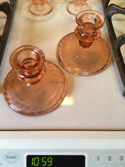 2 pink depression glass candle holders