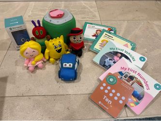 Storypod unit with collection of plushies and books