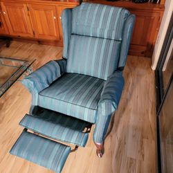 Tall upholstered La-Z-Boy recliner in dark blue-green striped fabric

