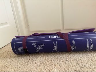 Yoga mat with stretch diagrams on it