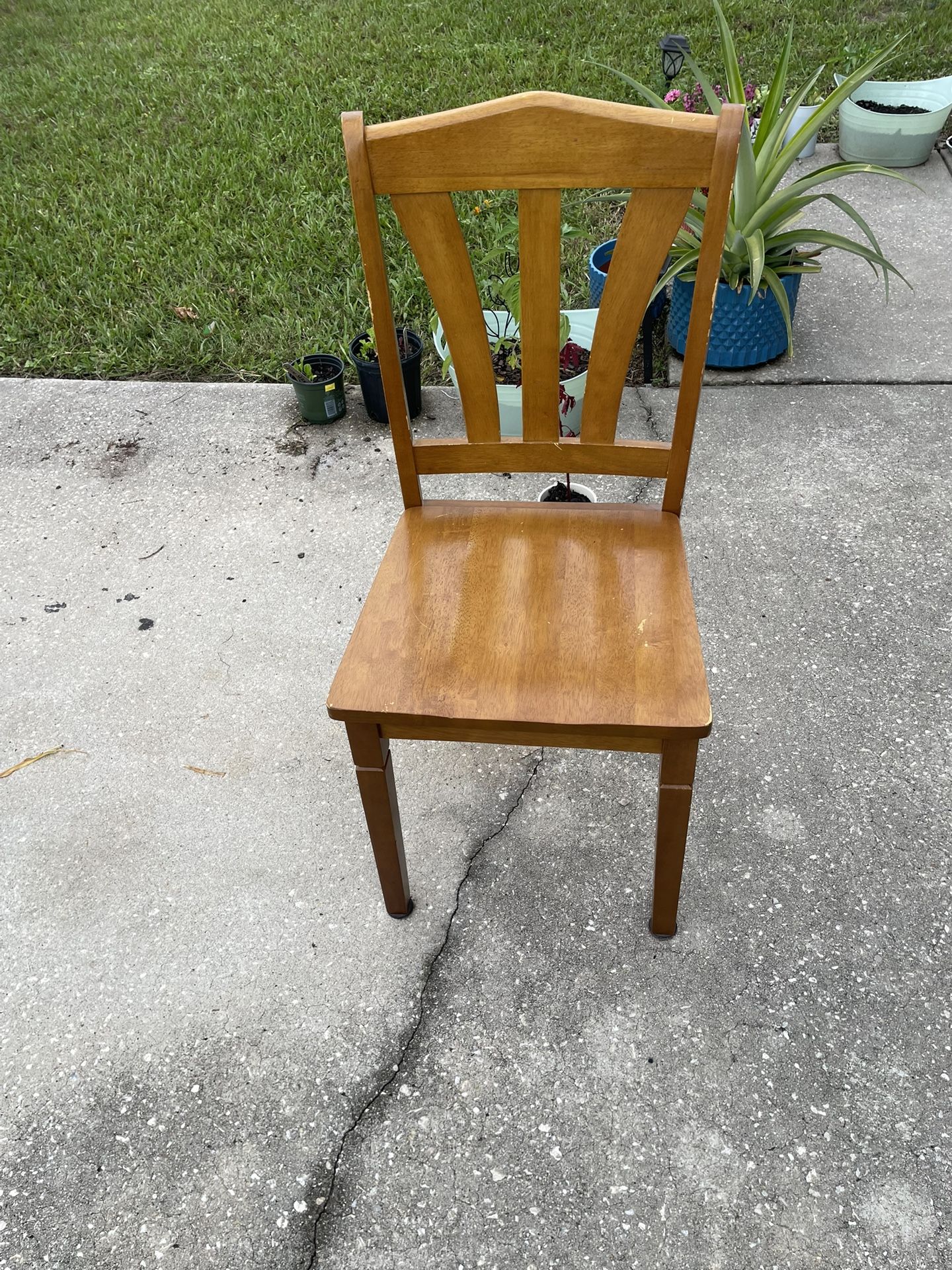Dining table and 4 matching chairs in good, sturdy condition. The set is solid wood with a classic natural finish. Great for a kitchen or dining space
