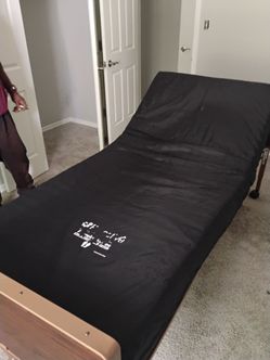Adjustable hospital bed in good condition