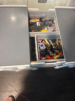 Legos table with a bunch of Legos