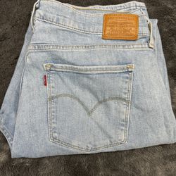 Levi’s 724 High Rise Straight 33x32” Distressed Jeans in great shape!  
