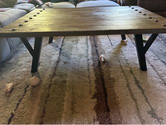 Rustic style coffee table with cool studs