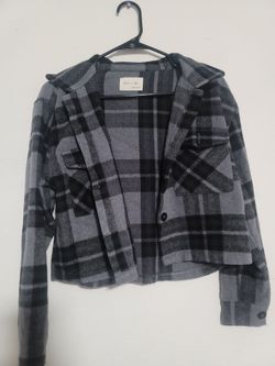 grey and black plaid cropped shacket with a button-down front and chest pockets