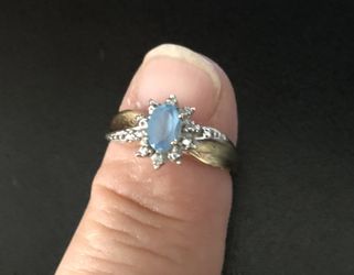 Ladies blue topaz with diamond accents