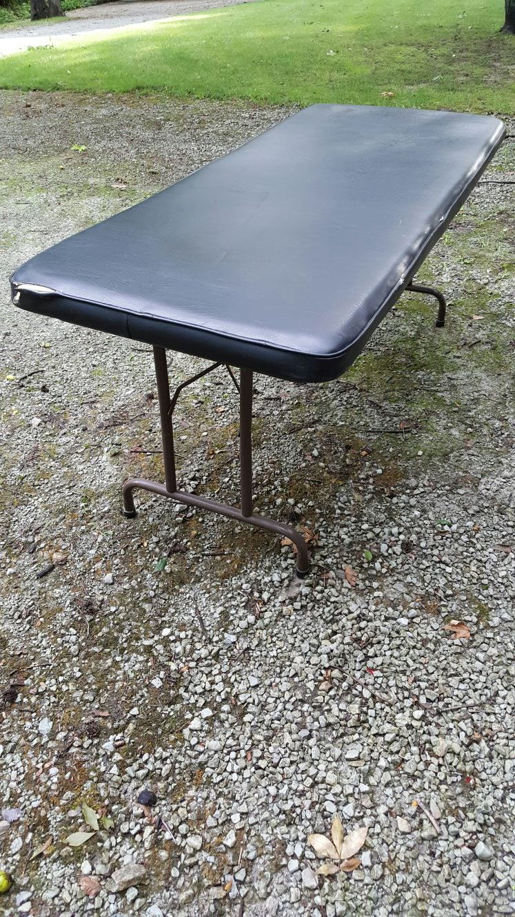 Massage table