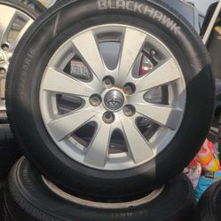 16 inch Toyota Camry used wheels and tires (contact info removed) good tires