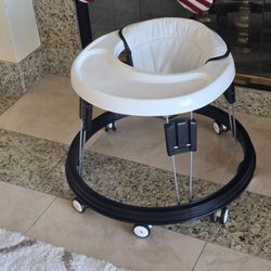 Foldable Baby Walker Excellent Condition.