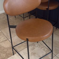 Four hands leather stools