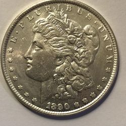 1890-CC EF MORGAN SILVER DOLLAR, CLEANED ROUGHLY ON OBV. FREE SHIPPING.