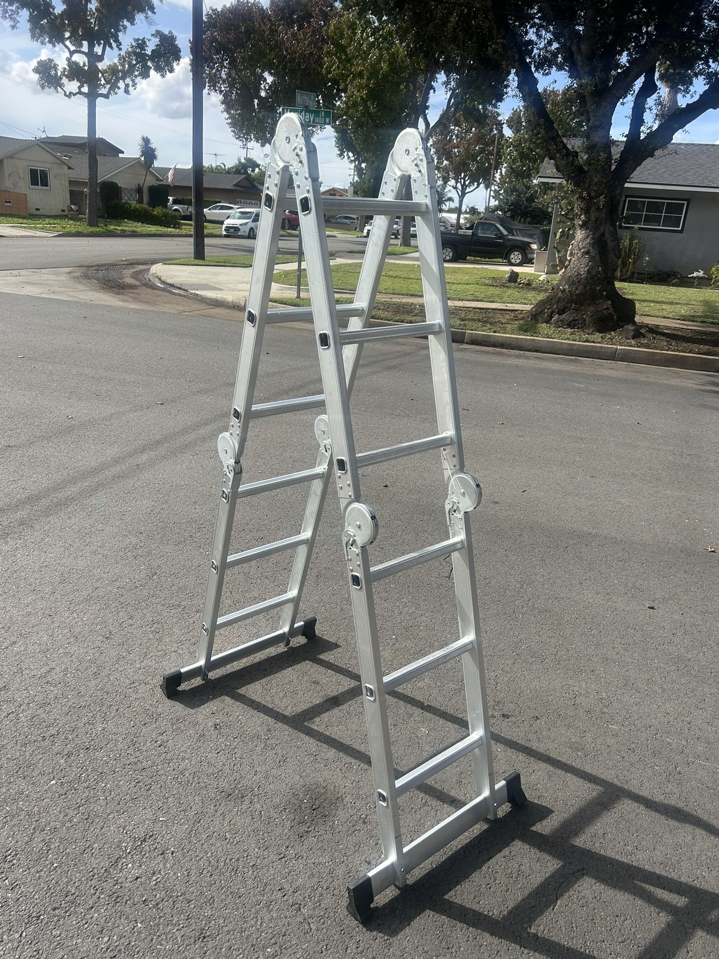 2025. Aluminum 12 foot ladder for $90.