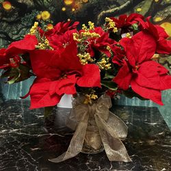 Nice Large Handmade Artificial Red Poinsettias and Yellow flowers with Gold Bow.  Comes with glass vase.   