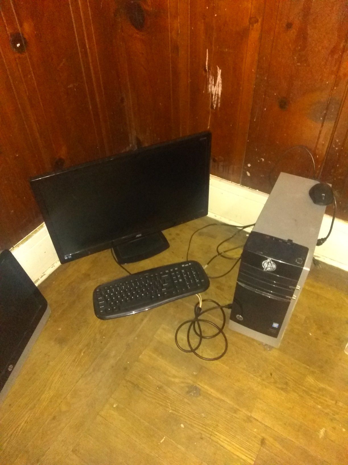 Computer with wireless keyboard and mouse. Big monitor