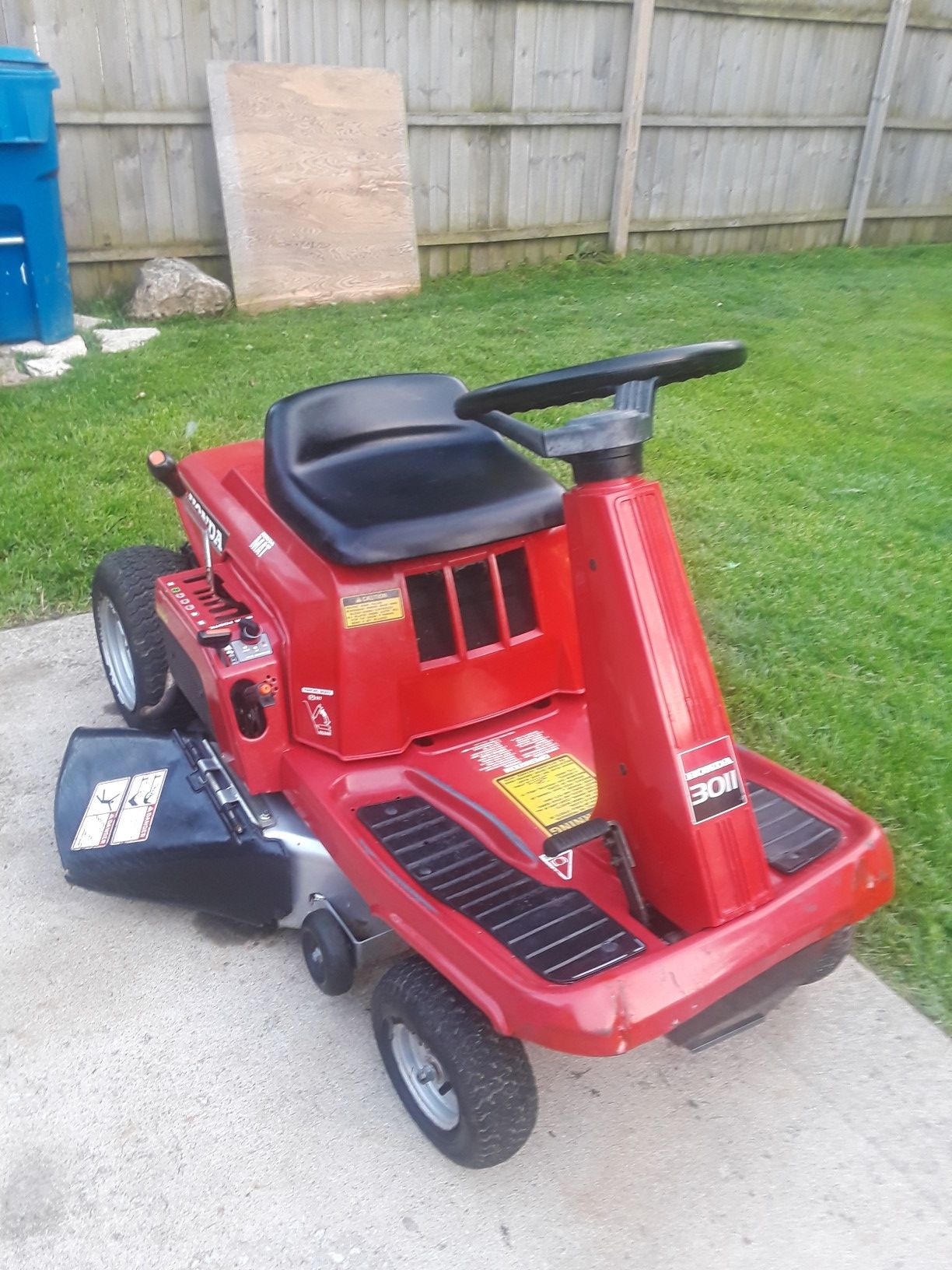 For sale a 30 inches cut 11hp Honda H3011 riding lawnmower.