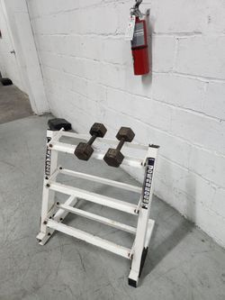 $120 Rack plus Pair Dumbells as appear...used Condition.  Little Havana  Miami 33130. Delivery for extra