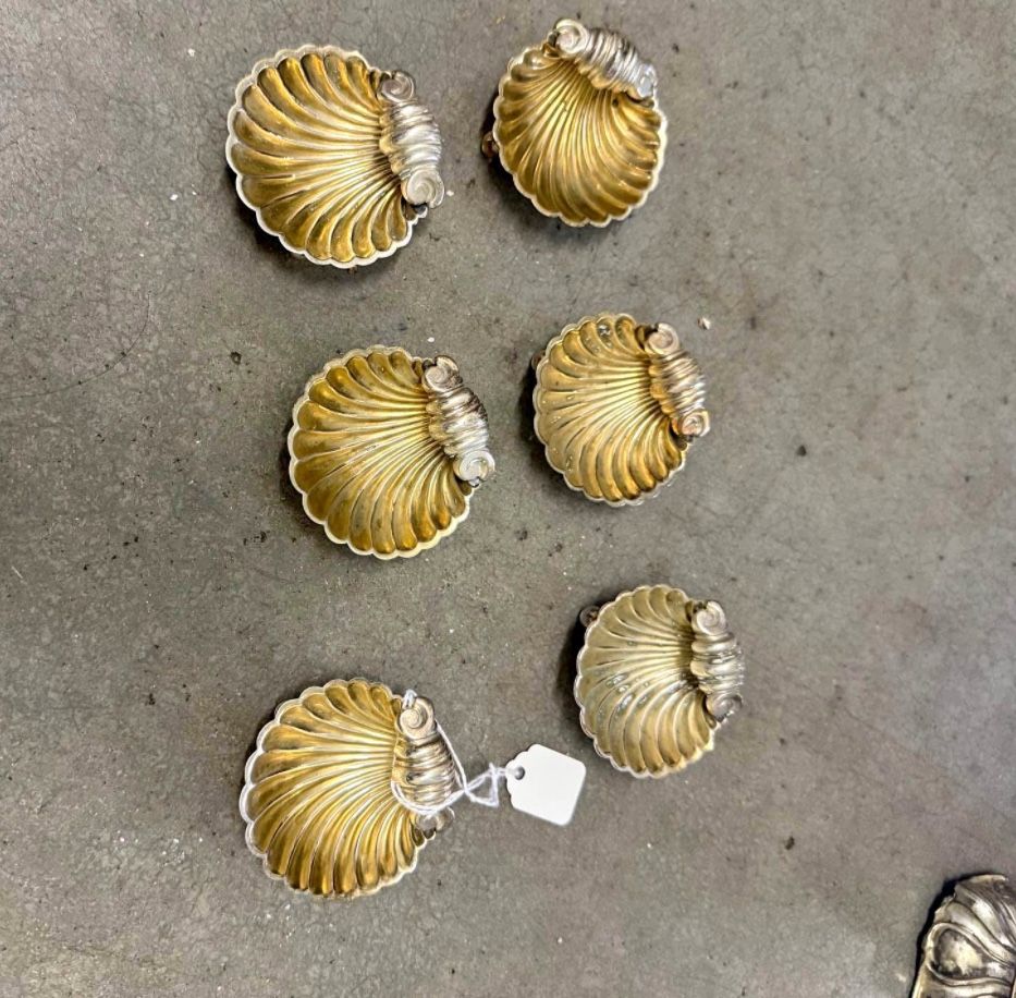 Vintage mini shell-shaped silver dishes.