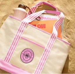 Victoria’s Secret VS canvas tote bag beige/pink Brand New  This reliable Canvas Tote is designed with a faux leather Victoria's Secret monogram patch