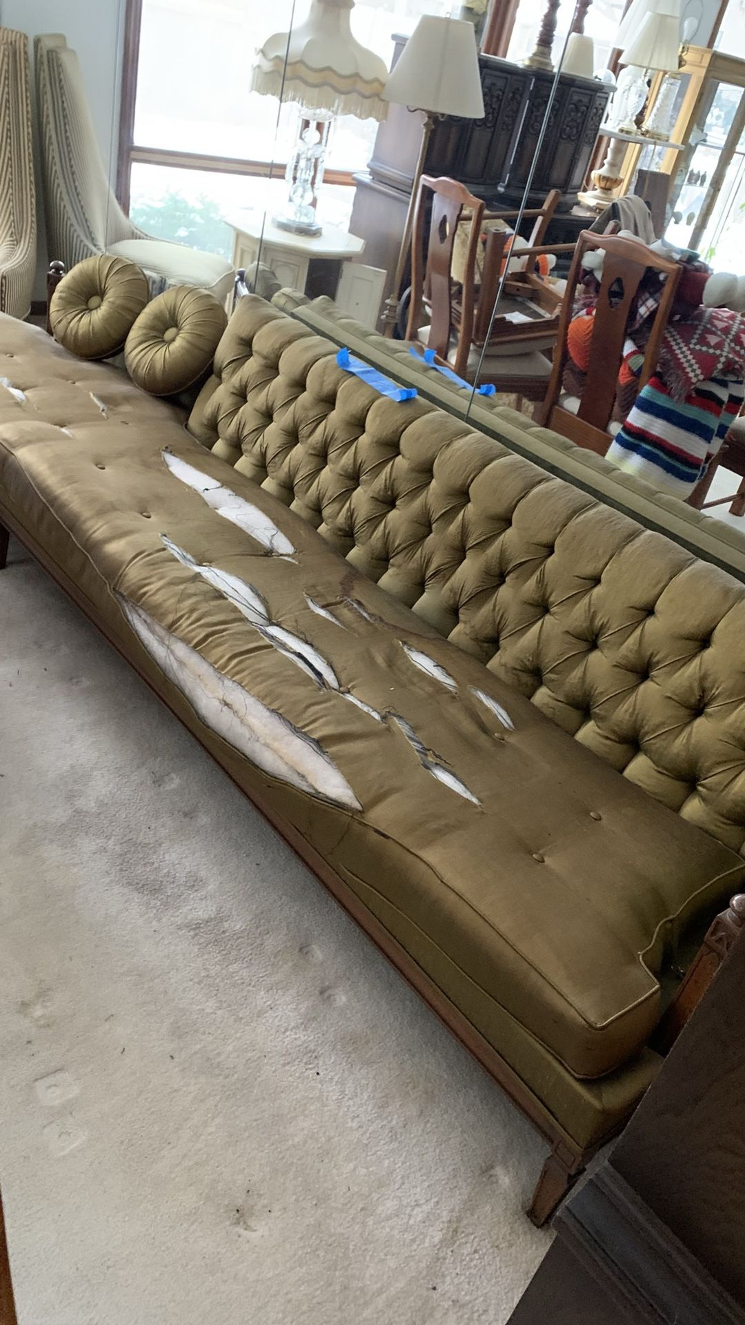 Vintage Green 10’ Couch that requires a Reupholster