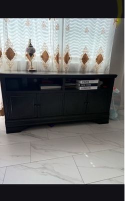 TV stand with shelves and cabinets