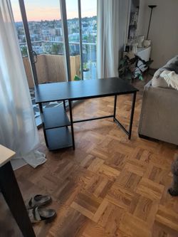Black desk with shelves
