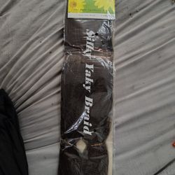 synthetic "Silky Yaky Braid" hair extensions. 