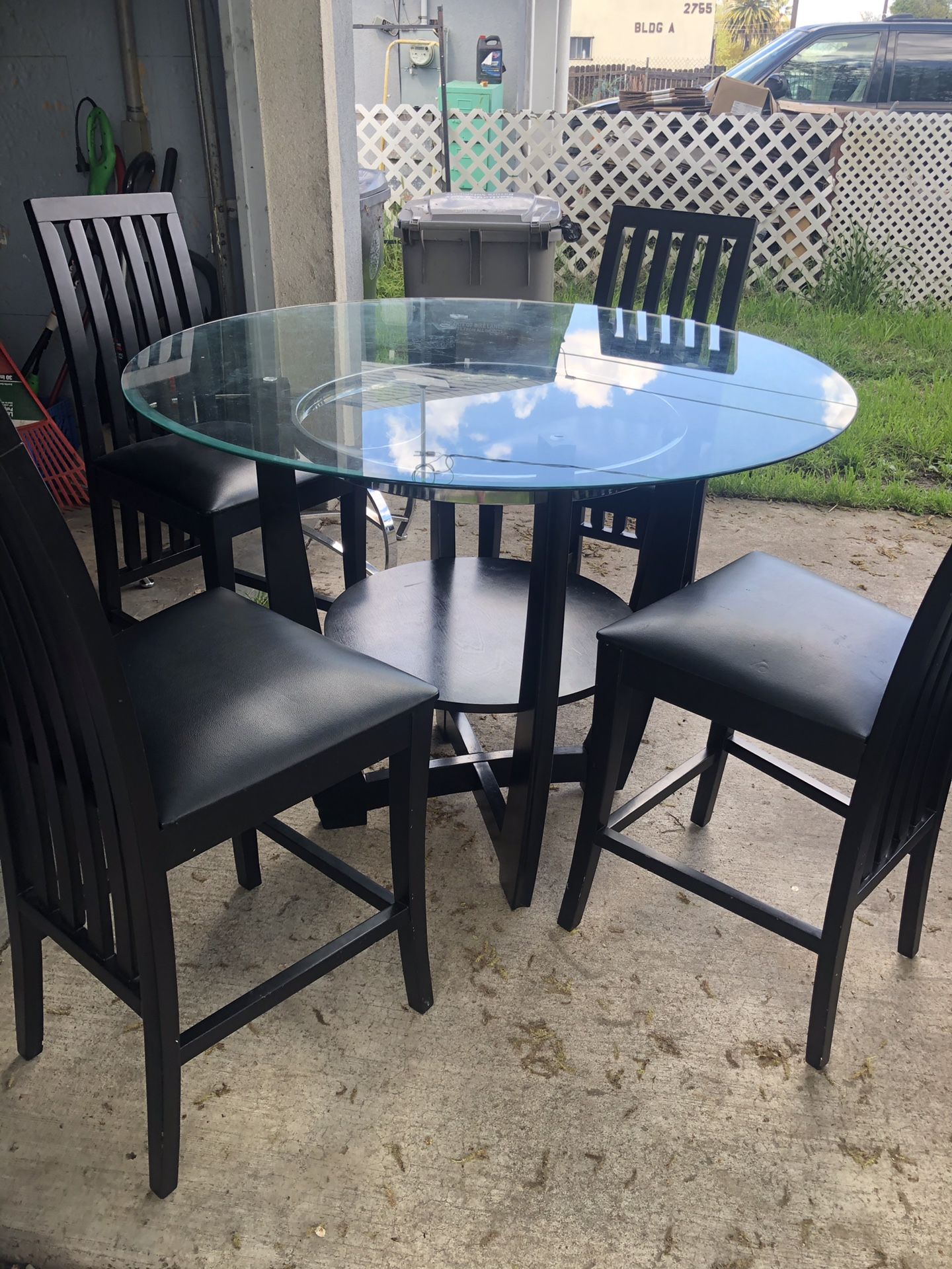 Glass table with 4 chairs