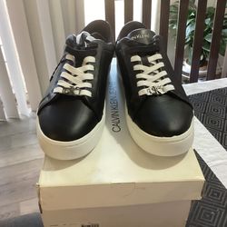 Tenis  Calvin Klein de hombre,color negro,talla 10 usa. Nuevo.
