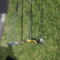 ASSORTED GOLF CLUBS.   ONLY "19 EACH