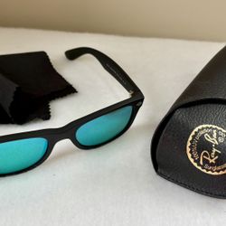 Authentic Ray-Ban RB2132 Wayfarer Classic sunglasses with Ray Ban case and microfiber cleaning cloth that came with them.  Considered Matte Black with