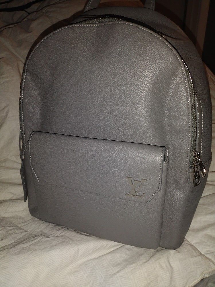 LV Grey Book Bag Retail $3400