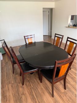 Wooden table with 6 chairs