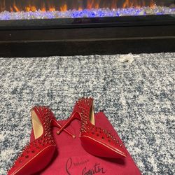CHRISTIAN LOUBOUTIN