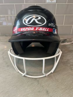 Rawlings Vapor batting/ helmet with face guard. Size 6¼–6⅞ (Youth).