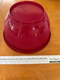 Spacious red mixing bowl. About 11 inches wide.