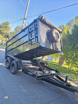 NEW DUMP TRAILERS 12x8x4 ROLLING TARP AND SPARE TIRE 2026 YEAR ELECTRIC BRAKES LIGHTS REMOTE CONTROL TITLE IN HAND READY FOR WORK,se habla ESPAÑOL