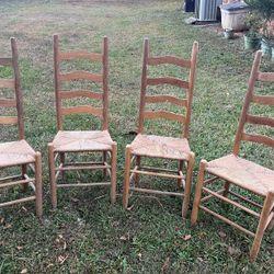 Set of four antique ladder-back chairs with woven rush seats