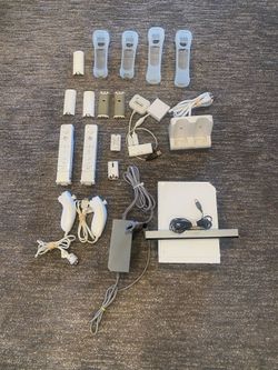 Wii w/ accessories and 17 games