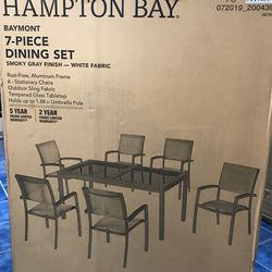 Baymont 7 Piece Aluminum Patio Outdoor Patio Dining Set with Smoked Glass Table Top and Sling Dining Chairs for Sale in Grand Prairie TX OfferUp