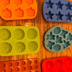 $5 each There is a variety of silicone molds, to include pumpkins, Santa‘s belt, stars, butterflies, ladybugs, fireflies, candy molds   $25 for the lo