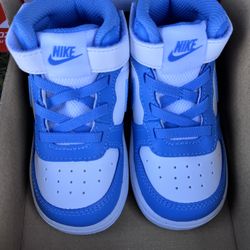 Nike mid high top blue 7c