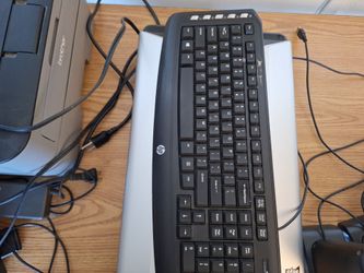 Used gaming mouse and web camera and keyboard