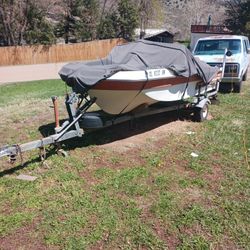 Trihull Boat With Trailer.