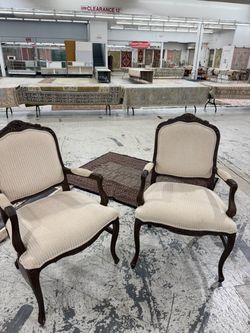 Pair of French Provincial Carved Armchairs