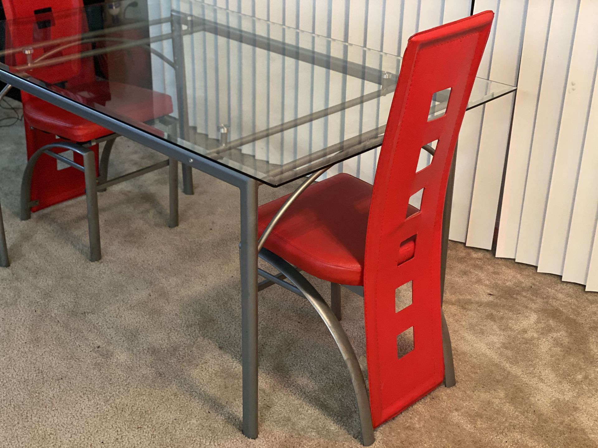 Glass Dining Table with 2 Red Chairs