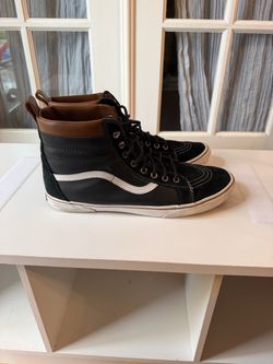 These are Vans Sk8-Hi MTE (Mountain Edition) high-top sneakers in the Black / Leather / Tan colorway. $50 OBO