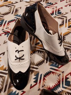 Black and White Two-Tone Wingtip Shoes